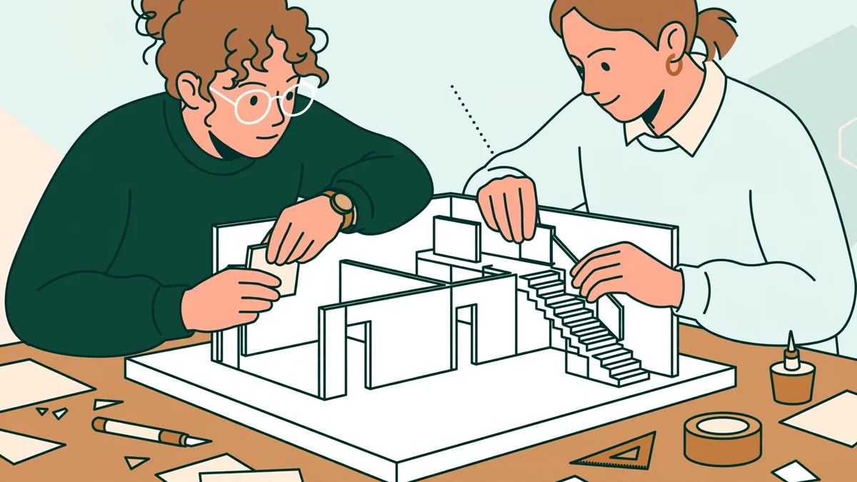 Deux étudiantes assemblent ensemble une grande maquette blanche d'espace intérieur avec cloisons et escalier, en dessin d'illustration